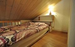 Haus-Gamma-studio-gamma-upstairs-bed-with-light-on