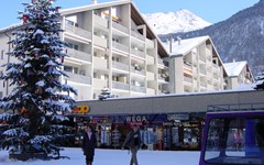 haus-viktoria-zermatt-winter-view-with-mountain-blue-sky-and-snow